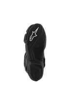 Bottes Alpinestars Stella SMX-6 V3 Drystar®, vue de dessous de la semelle en caoutchouc noir, avec un logo en étoile Alpinestars blanc proéminent, des motifs d'adhérence texturés pour la traction et un design profilé pour le contrôle de la moto.