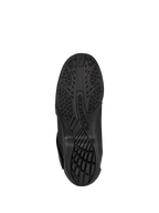 Bottes Alpinestars New Land GORE-TEX, noires, vue de dessous de la semelle extérieure en composé de caoutchouc vulcanisé, motif de crampons texturé pour l'adhérence et la traction, avec logo Alpinestars embossé, chaussures de moto de route-touring