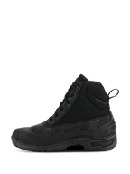 Bottes Alpinestars Woman Judy Waterproof, bottes de moto noires, design montant d'inspiration combat avec vue de profil, dotées de lacets et d'une boucle de tirage arrière, semelle en caoutchouc surélevée, construction durable en cuir et textile pour la conduite urbaine