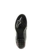 Bottes Alpinestars Stella Valencia Waterproof pour femme, noires, vue de la semelle montrant le caoutchouc texturé avec motif antidérapant et logo Astars blanc, conçues pour la stabilité en moto touring.