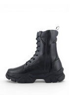 Alpinestars bottes Ava, bottes de moto urbaine pour femme en cuir noir avec une semelle épaisse surélevée en caoutchouc.
