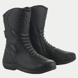 Bottes Alpinestars Origin Drystar®, bottes de touring moto imperméables, noires, dotées d'une tige en microfibre avec zones de flexion en accordéon, renfort de sélecteur synthétique et logo embossé, conçues pour la route et l'aventure