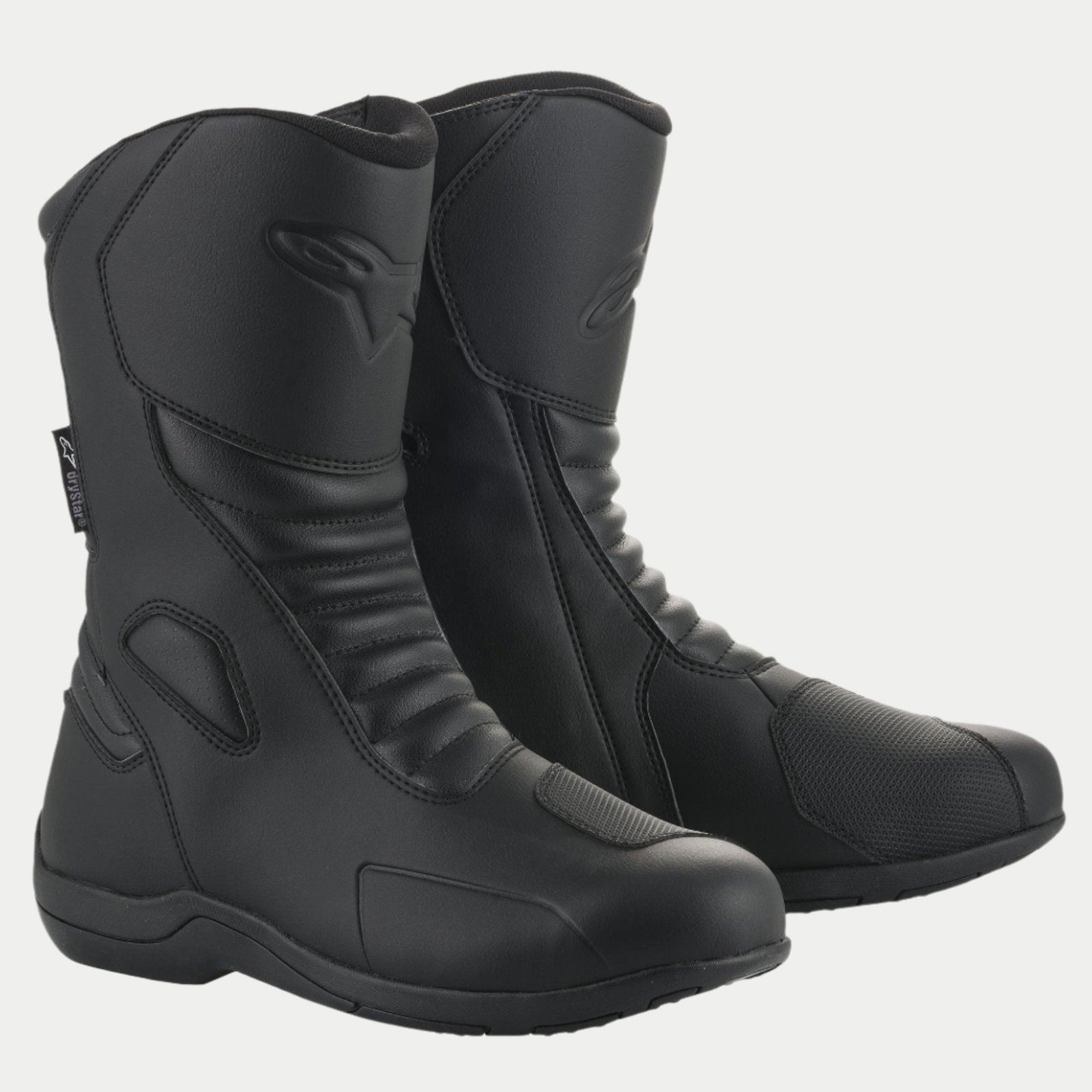 Bottes Alpinestars Origin Drystar®, bottes de touring moto imperméables, noires, dotées d'une tige en microfibre avec zones de flexion en accordéon, renfort de sélecteur synthétique et logo embossé, conçues pour la route et l'aventure