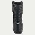 Bottes Alpinestars Origin Drystar®, bottes de moto touring, noires, vue arrière avec zones de flexion en accordéon sur le tendon d'Achille et le mollet, détail réfléchissant au talon et construction en microfibre durable