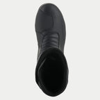 Bottes Alpinestars Origin Drystar®, noir, vue de dessus montrant la protection de sélecteur synthétique et la zone d'accordéon à l'avant, construction durable en microfibre, chaussures de moto imperméables pour le touring et l'aventure