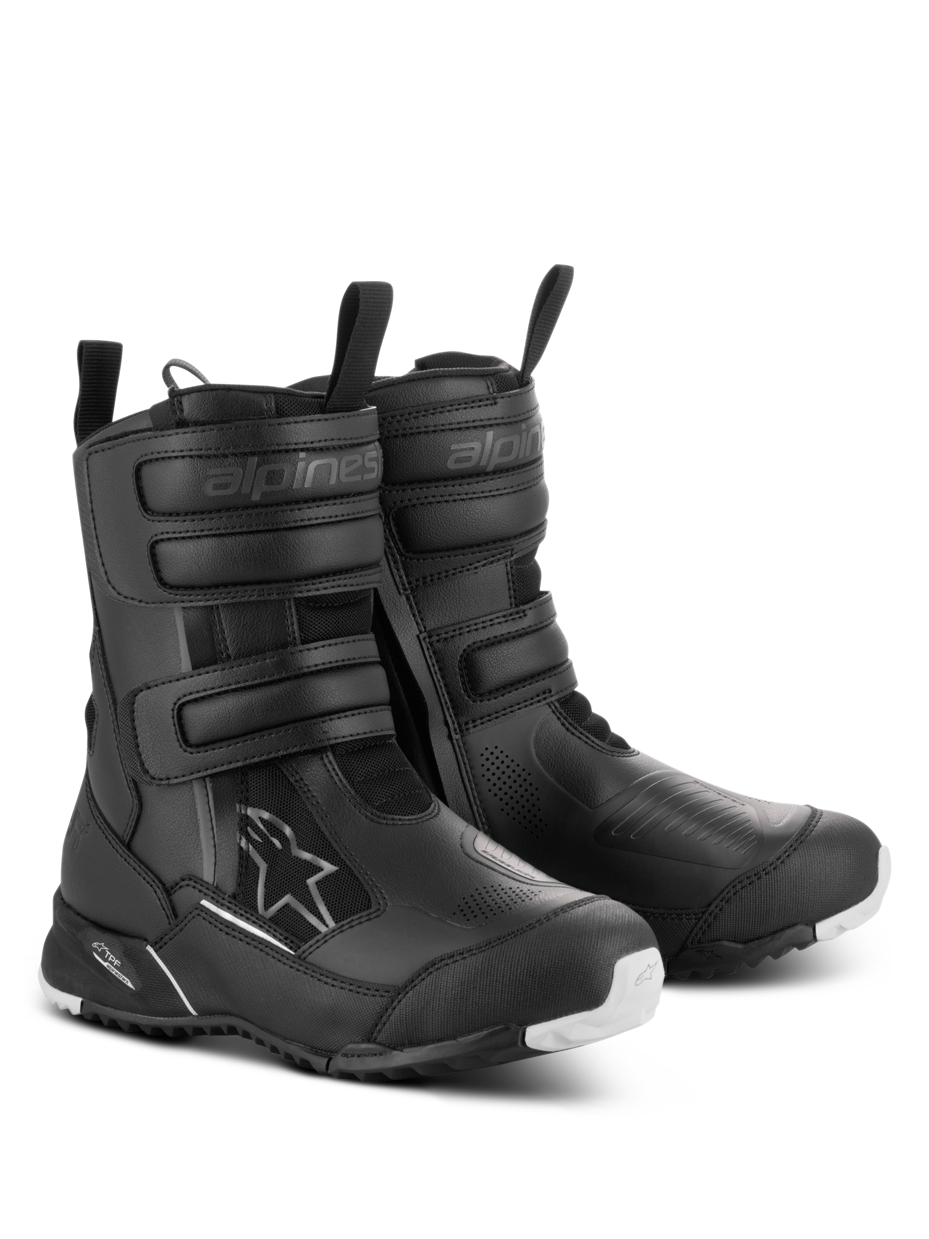 Bottes Alpinestars Stella RT-7 Touring Drystar® pour femme, noires, bottes de moto touring imperméables dotées de trois sangles Velcro, d'une double fermeture éclair et d'une semelle robuste avec des accents blancs.