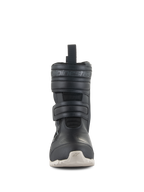 Bottes Alpinestars Stella RT-7 Touring Drystar® pour femme, bottes de moto touring noires avec semelle blanche, vue de face montrant la double fermeture par sangle Velcro et le logo Alpinestars embossé, design technique pour la conduite sur route et l'aventure