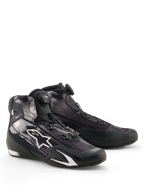 Chaussures Alpinestars Celer Superair, chaussures de moto, noir et blanc, dotées d'un système de fermeture Rotor à molette sur la languette, logo étoile blanc sur une tige en textile respirant et design sportif à profil bas.