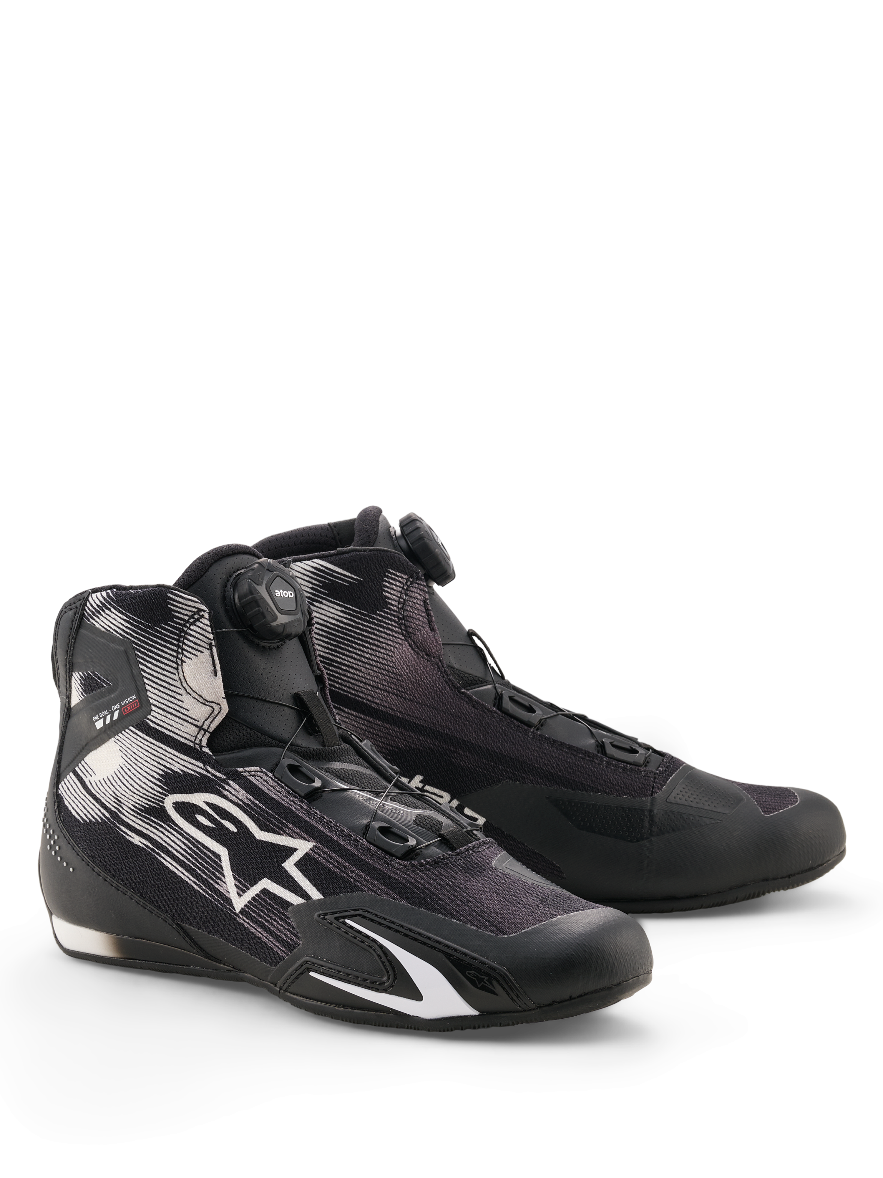 Chaussures Alpinestars Celer Superair, chaussures de moto, noir et blanc, dotées d'un système de fermeture Rotor à molette sur la languette, logo étoile blanc sur une tige en textile respirant et design sportif à profil bas.