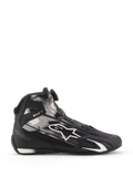 Chaussures Alpinestars Celer Superair, chaussures de moto, noir et blanc, vue de profil avec motifs graphiques blancs et grand logo Astar, système de fermeture Rotor sur la languette, protection de la cheville en TPU avec slogan « ONE GOAL ONE VISION », tige en textile respirant pour temps chaud