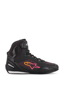 Chaussures Alpinestars Stella Faster-3 Rideknit® pour femme, chaussures de moto, noir, jaune et rose, vue de profil avec tige en maille respirante, logo étoile en dégradé éclatant et sangle de cheville à scratch.