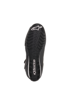 Chaussures femme Alpinestars Stella Faster-3 Rideknit®, Noir Jaune Rose, vue de la semelle extérieure présentant une semelle en caoutchouc noir avec texture ondulée, logo et lettrage Alpinestars blancs, conception durable pour la conduite moto sur route
