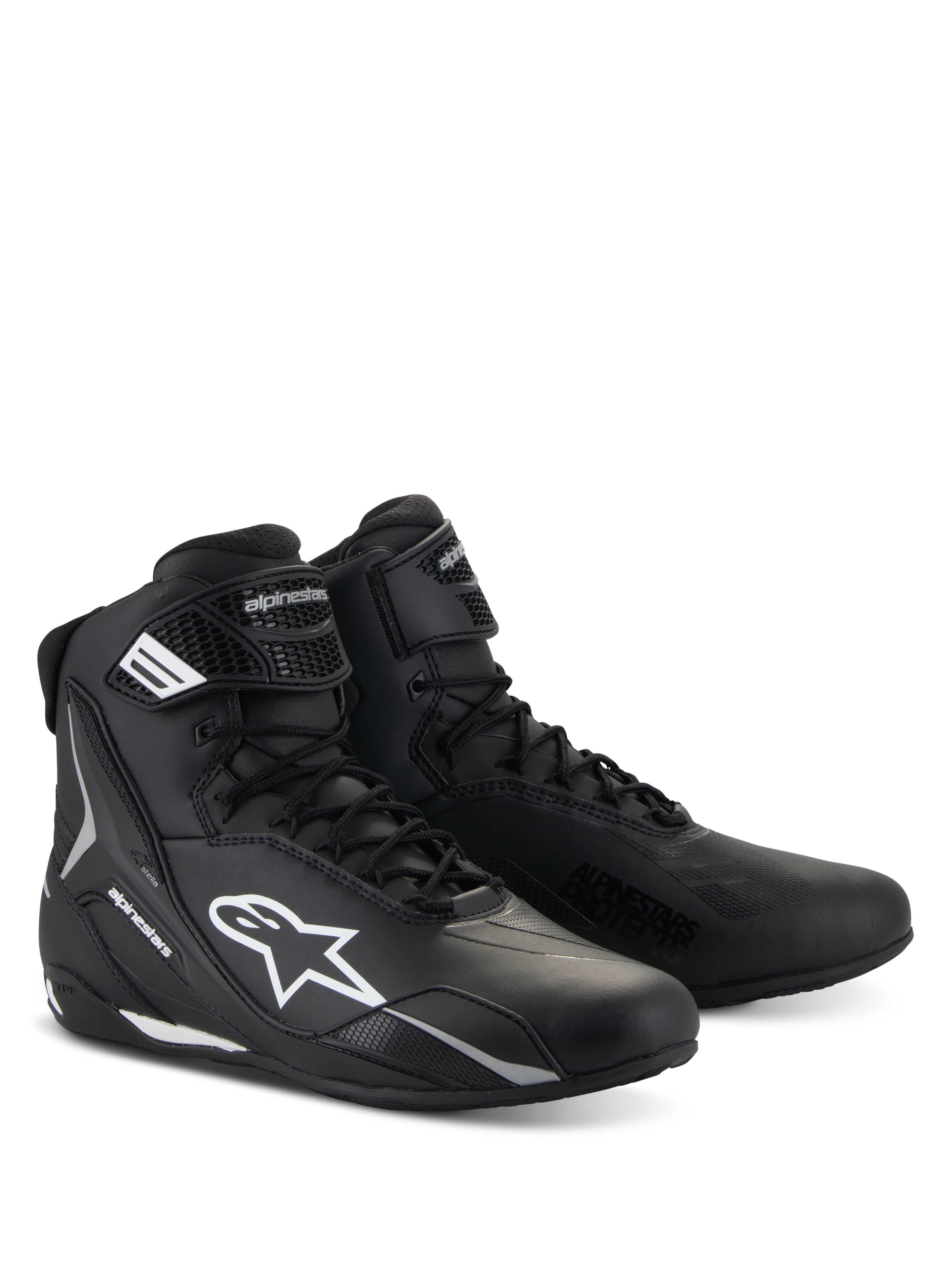Chaussures Alpinestars Stella Faster-4, chaussures de moto pour femme, noir avec accents blancs, design sportif montant avec fermeture à lacets et sangle de cheville à scratch, construction en microfibre durable avec logos latéraux de protection