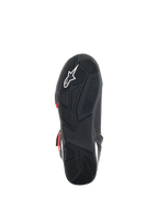 Chaussures Alpinestars Superfaster, vue de la semelle, semelle extérieure en caoutchouc noir avec motif d'adhérence technique, logo Astars blanc et marquage Alpinestars embossé, conçues pour la conduite moto et le confort de marche