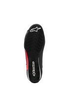 Chaussures Alpinestars Sektor, chaussures de moto, noir, blanc et rouge fluo, vue de dessous montrant une semelle en caoutchouc texturée avec logos blancs et détails rouges, design léger pour la conduite sur route