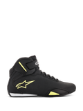 Chaussures Alpinestars Sektor, chaussures de moto, noir et jaune fluo, vue latérale montrant le logo étoile jaune, sangle de cheville avec logo et détail blanc au talon sur une tige en microfibre épurée.
