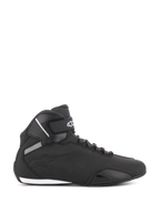 Alpinestars Sektor Shoes, Black Motorcycle Riding Shoes, side profile view, sleek microfiber construction with reinforced toe and ankle strap, white Alpinestars logo, athletic sport-styled protective footwear.