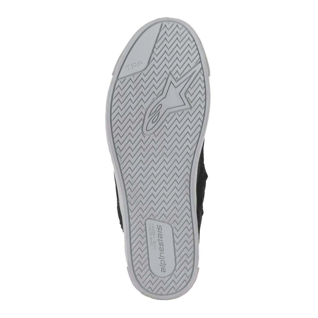 Alpinestars Stated Shoes, bottom view of sole, light gray vulcanized rubber with herringbone traction pattern, featuring Alpinestars star logo and TPF branding, urban motorcycle riding shoe detail