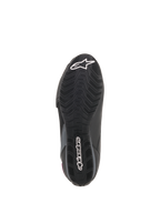 Chaussures Stella Faster-3 Drystar® Alpinestars pour femme, vue de la semelle, semelle extérieure en caoutchouc noir avec motif d'adhérence texturé, logo étoile et lettrage Alpinestars blancs, construction de chaussure de moto durable
