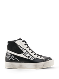 Alpinestars Stella Stated Flair Shoes, Women's High-Top Riding Shoes, Black and White, featuring perforated leather panels, bold logo branding, and a distressed worn-look sole, motorsport-inspired urban streetwear.