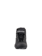Chaussures étanches Alpinestars Sektor, chaussures de moto noires, vue de face avec lacets noirs et sangle de cheville Velcro avec logo Alpinestars blanc, design épuré en microfibre pour des performances moto par tous les temps