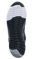 Chaussures de moto Alpinestars CR-X Drystar®, vue de la semelle extérieure, semelle en mélange de deux caoutchoucs noir, blanc et gris, motifs de crampons asymétriques pour l'adhérence, avec marquage TPF et logos étoiles