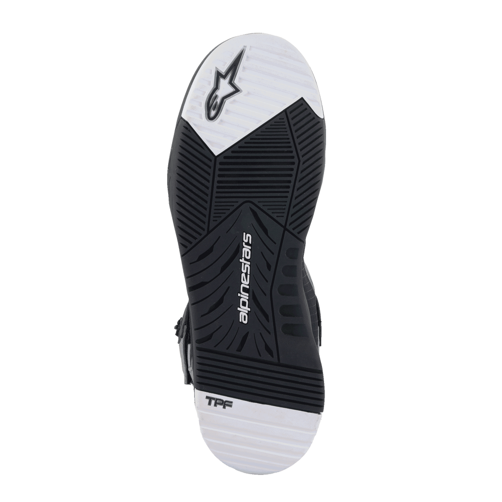 Chaussures Alpinestars Speedflight Street, vue de la semelle, semelle extérieure en caoutchouc à double densité noire et blanche avec motif de bande de roulement conique, avec logo Alpinestars et marquage TPF, chaussures de moto urbaines