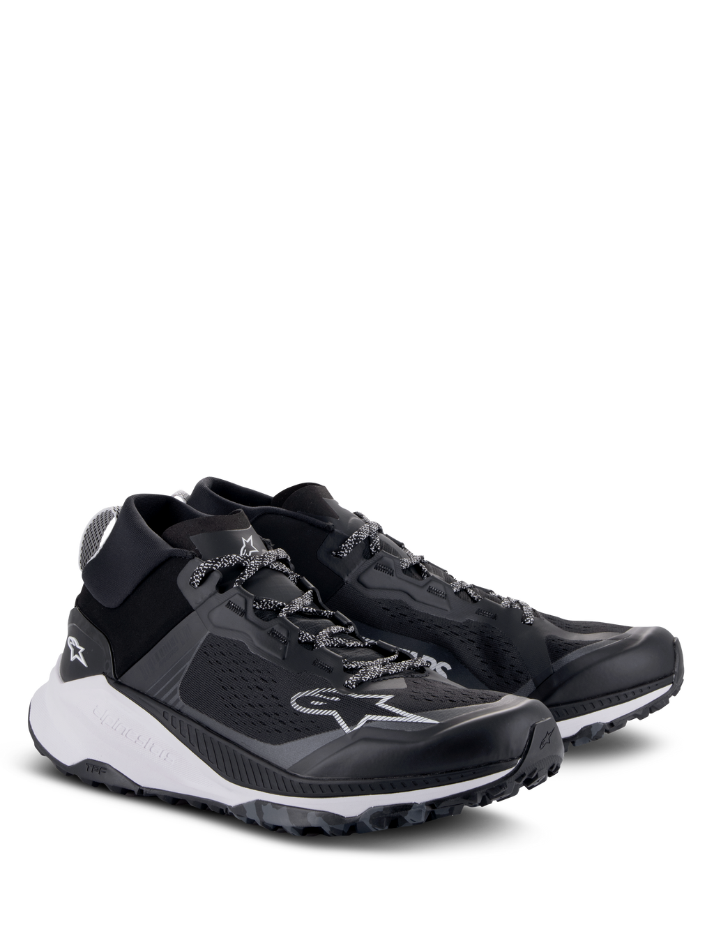 Chaussures Alpinestars Meta XR V2, chaussures de sportswear, noir, blanc et gris foncé, dotées d'une tige en maille monobloc, d'une semelle intermédiaire blanche épaisse et d'une semelle extérieure robuste, design sportif décontracté avec logo Alpinestars et lacets à motifs