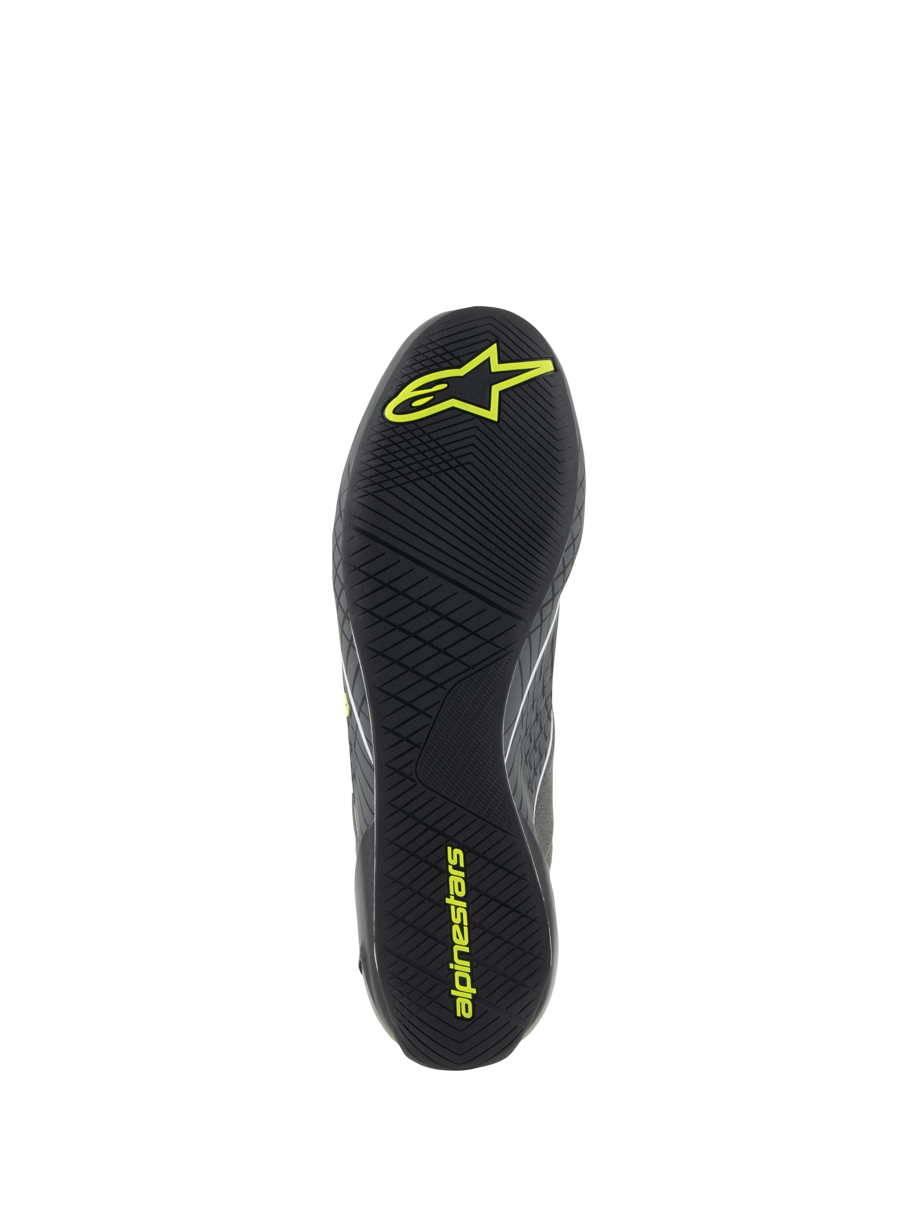 Chaussures Alpinestars Supertech, chaussures de course automobile, gris et jaune fluo, vue détaillée de la semelle extérieure en caoutchouc noir avec bande de roulement asymétrique texturée et logos Alpinestars jaunes pour l'adhérence aux pédales et la sensibilité.