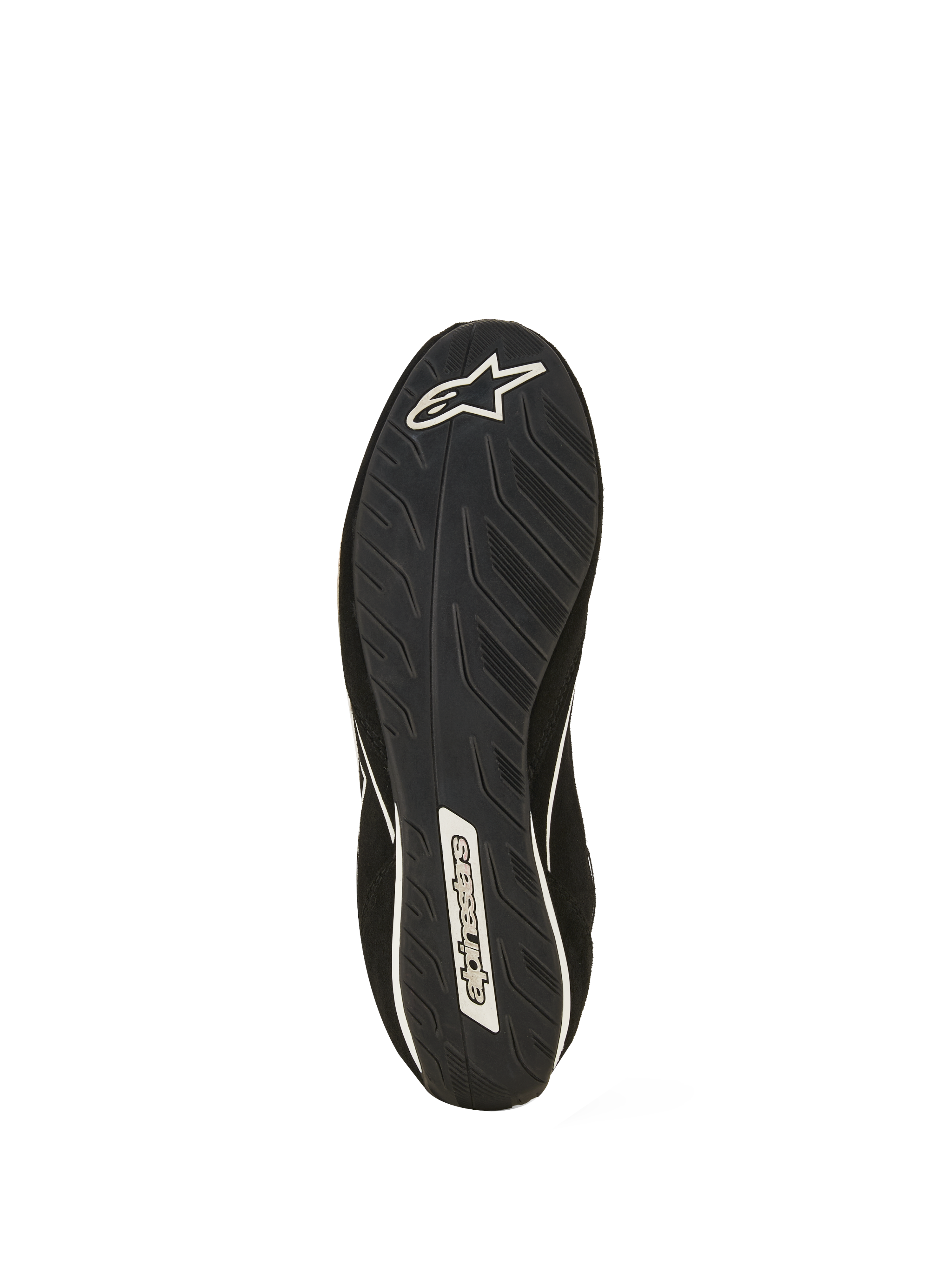 Chaussures Alpinestars SP V3 FIA, vue de la semelle de la chaussure de course noire, dotée d'un composé de caoutchouc exclusif avec adhérence texturée pour un meilleur ressenti des pédales, logo étoile Alpinestars blanc au talon et lettrage à la voûte plantaire