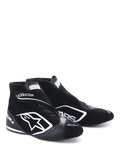 Alpinestars SP+ Shoes N, chaussures de course automobile, noir et blanc, avec un grand logo étoile blanc, modèle montant avec sangle de cheville, construction en daim et cuir, et semelle fine haute performance