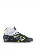 Alpinestars chaussures Tech-1 K V2, chaussures de karting pour homme, noires, blanches et jaune fluo, construction en microfibre légère, double système de fermeture avec sangle auto-agrippante, semelle en caoutchouc spécification Formule 1, vue de profil