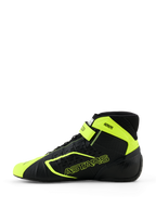 Chaussures de karting Alpinestars Tech-1 KX V3, noir et jaune fluo, vue de profil montrant la construction thermo-soudée sans couture, perforations découpées au laser, accents jaune fluo avec marquage ASTARS et sangle de cheville réglable, design motorsport élégant