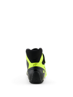 Chaussures Alpinestars Tech-1 KX V3 - FIA, noir et jaune fluo, vue arrière centrée sur le talon, accents jaune fluo avec logo étoile noir et marquage KX, chaussures de karting professionnelles