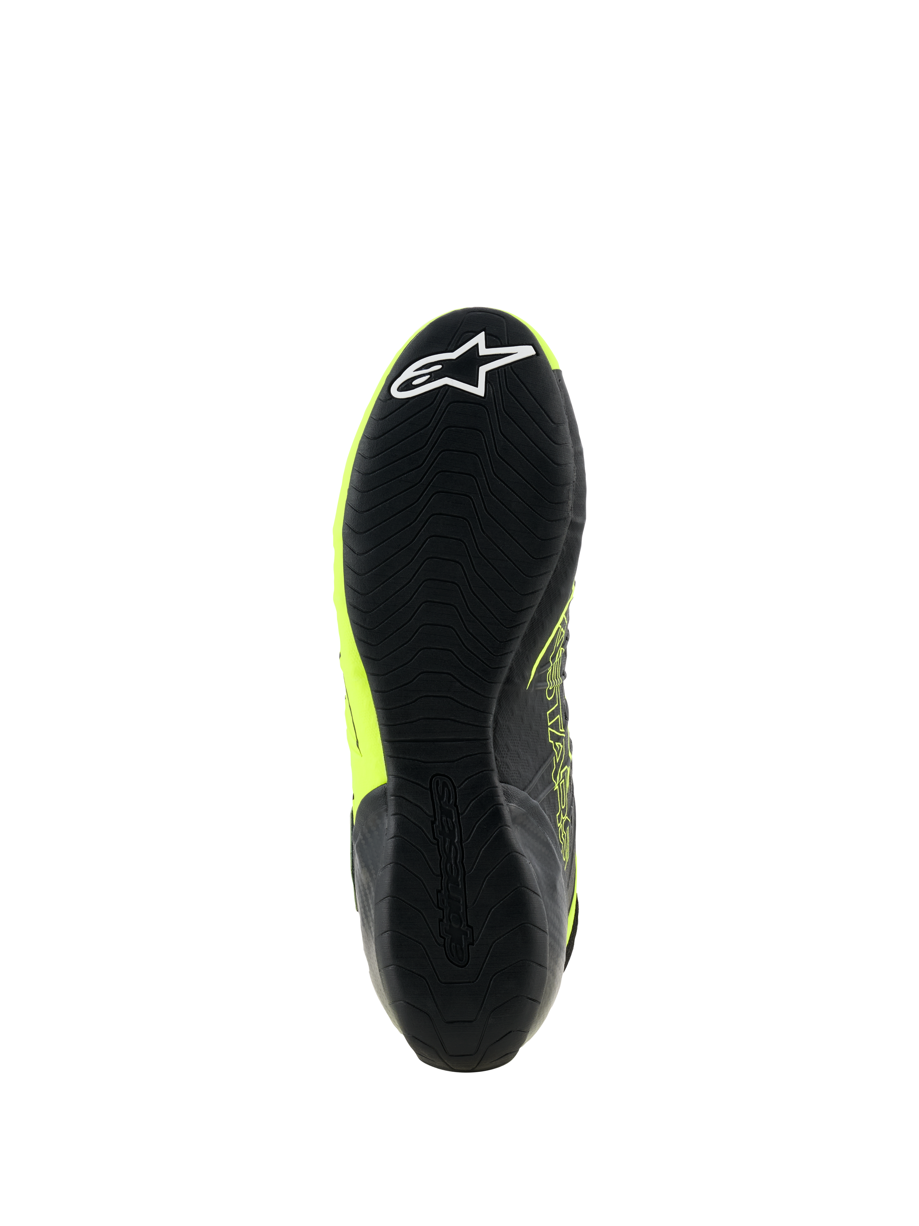 Chaussures Alpinestars Tech-1 KX V3, chaussures de karting, noir et jaune fluo, vue de dessous de la fine semelle en caoutchouc avec motif d'adhérence texturé et logo étoile blanc sur le talon, conçues pour la performance en sport automobile.