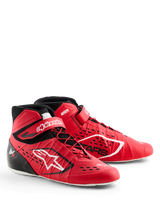 Chaussures Alpinestars Tech-1 KX V3, chaussures de karting, rouge et noir, dotées d'un laçage asymétrique et d'une sangle de cheville en velcro, logo Alpinestars blanc, entrées d'air découpées au laser et construction légère sans couture pour des performances de sport automobile professionnelles.