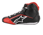 Chaussures Tech-1 K Junior Alpinestars, chaussures de karting, noir, blanc et rouge, profil latéral avec logo étoile blanc, col en maille rouge, lacets blancs et sangle à la cheville, design léger en microfibre et maille pour la course