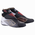 Alpinestars Tech-1 KZ V2 Shoes, Karting Racing Shoes, Black White and Gold with Red accents, featuring a seamless knitted upper and dual strap closure, protective toe cap, gold star logo detailing, high ankle support for precision karting performance