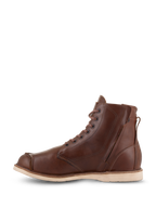Chaussures Alpinestars Oscar Monty V2, chaussures de moto en cuir brun, vue latérale interne avec fermeture éclair et lacets, design à bout mocassin avec semelle compensée claire, chaussures de protection d'inspiration héritage