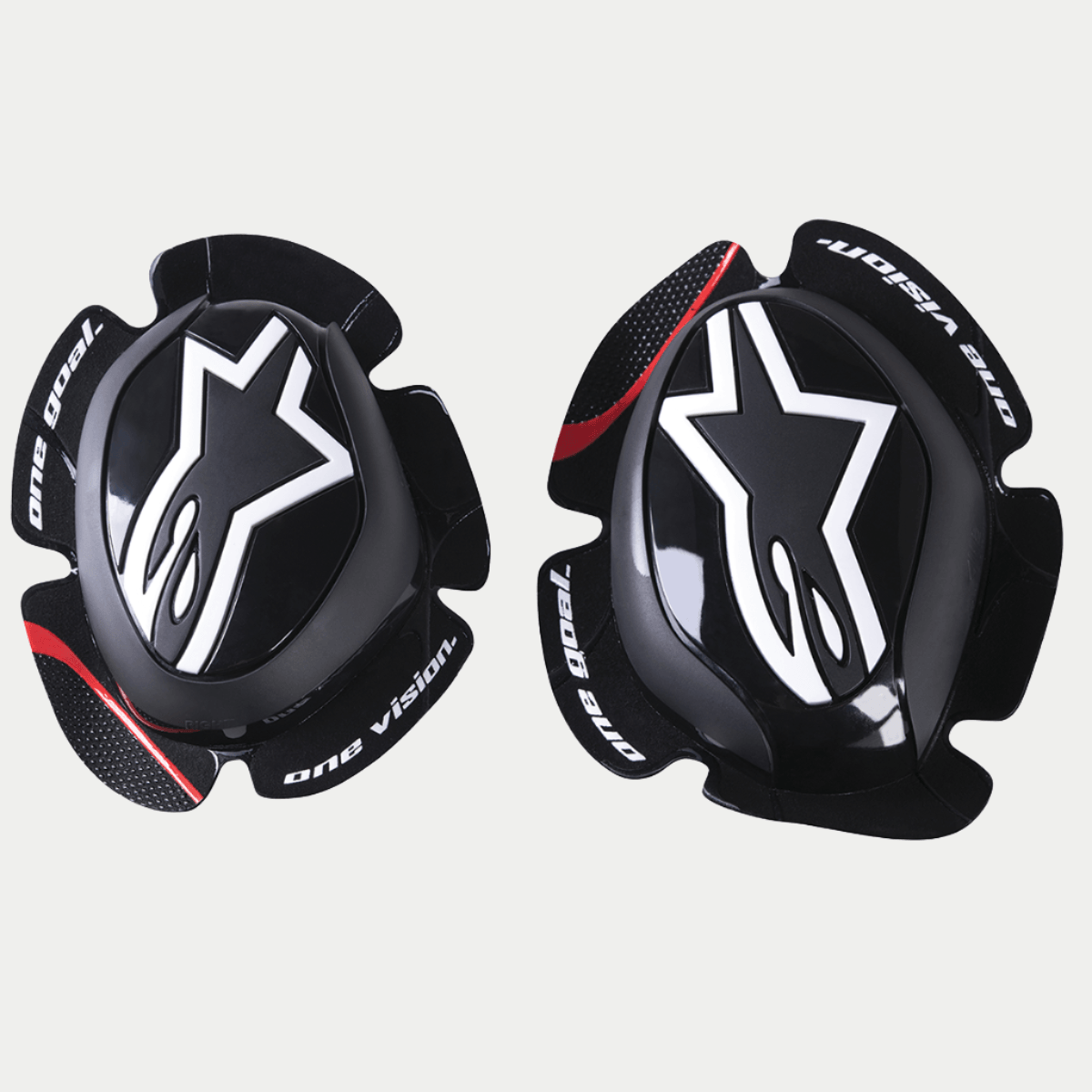 Sliders de genou Alpinestars GP Pro, noirs, avec logo étoile Alpinestars blanc, texte 'one goal. one vision.' sur les bords, bande d'accent rouge sur les ailes texturées, composé polymère de forme anatomique pour équipement de course moto