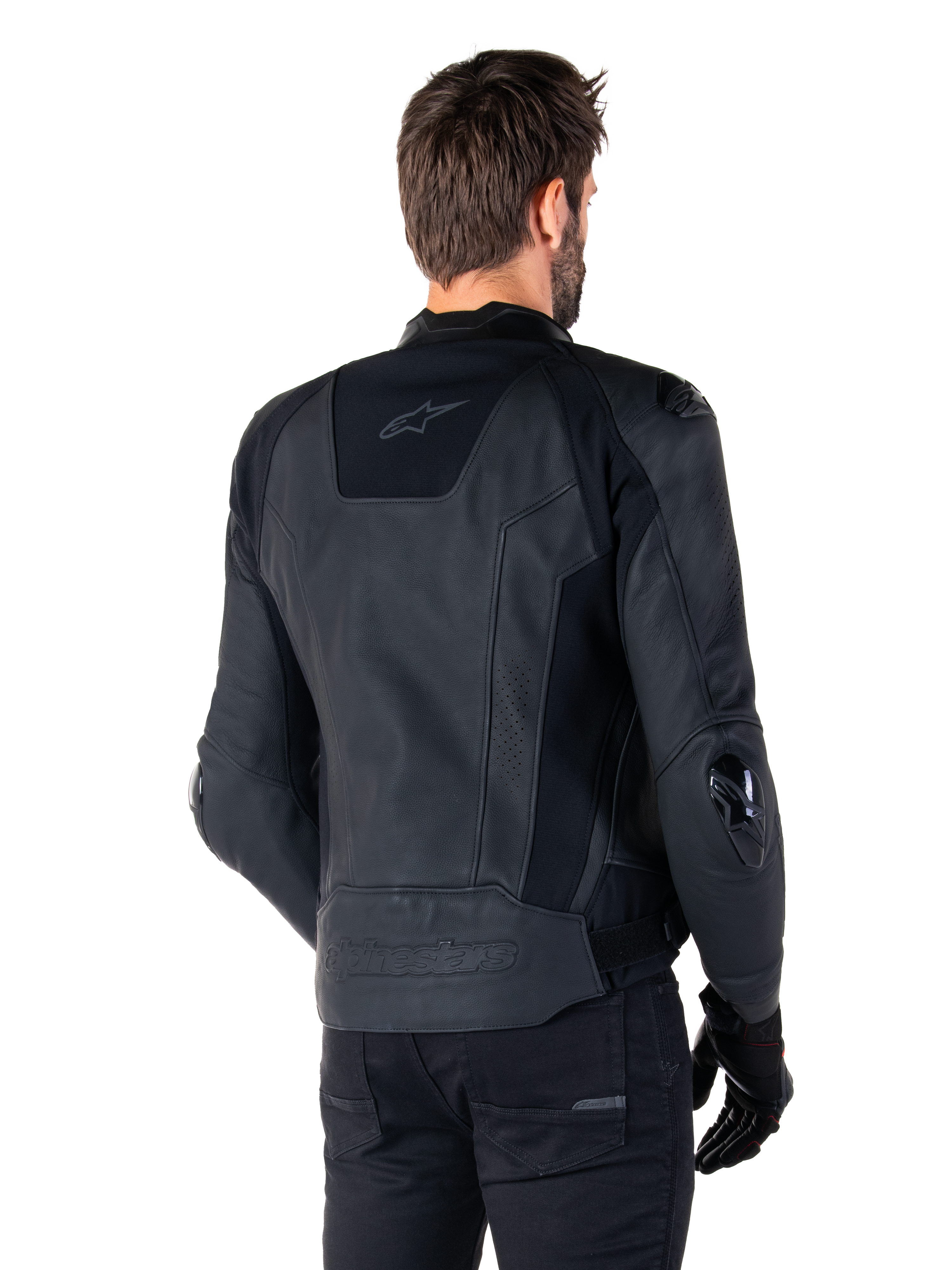 Veste en cuir Alpinestars Missile V3, Noir, vue de dos sur modèle, veste de sport de course haut de gamme en cuir, avec logo Alpinestars embossé en bas du dos et sliders de coude en TPU
