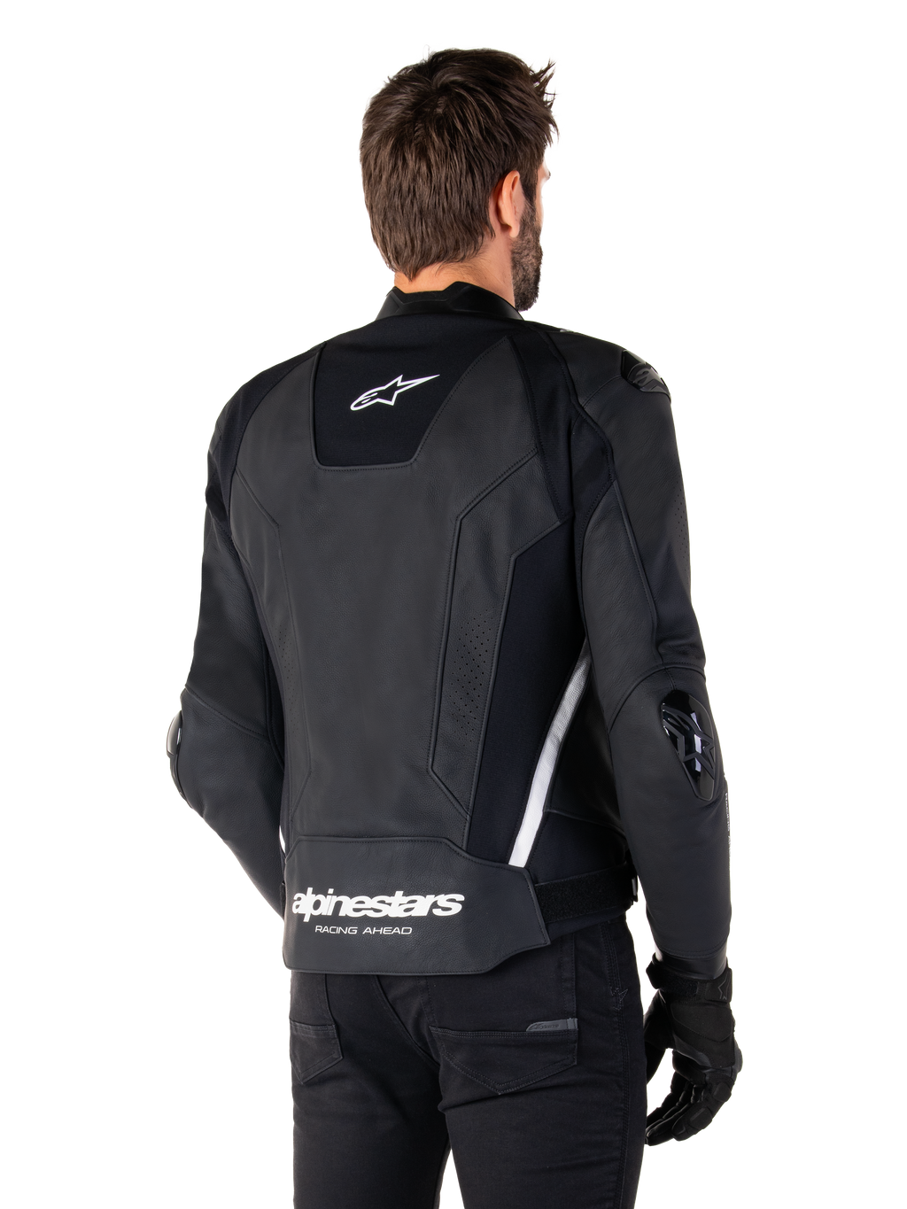 Veste en cuir Alpinestars Missile V3, vue de dos, noir et blanc, avec le logo étoile Alpinestars sur le haut du dos et le nom de la marque sur le bas du dos, sliders de protection aux coudes et aux épaules, équipement de course en cuir premium