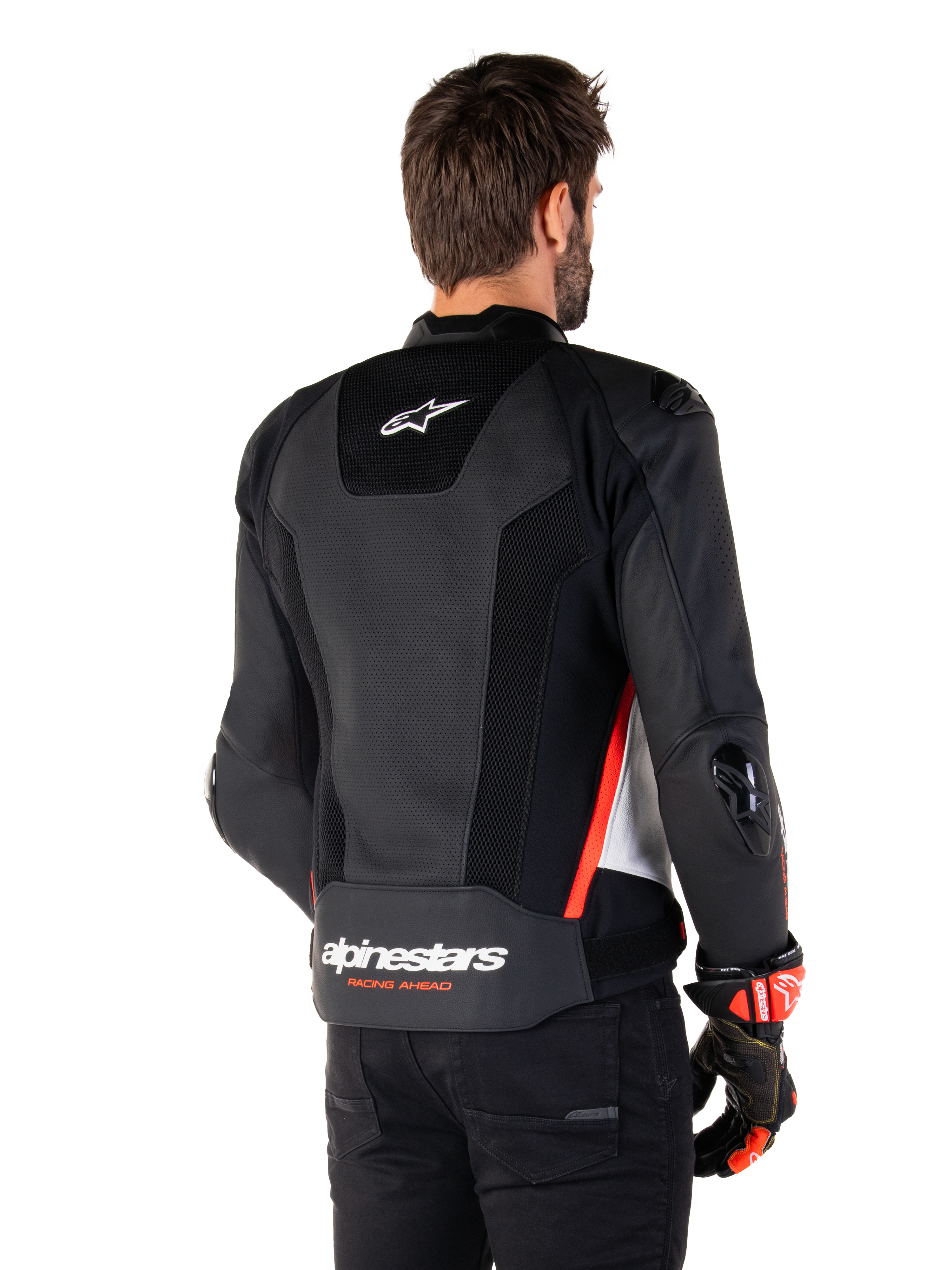 Veste en cuir Alpinestars Missile V3 Airflow, vue arrière, noir, blanc et rouge fluo, dotée de perforations étendues pour une ventilation optimale, de sliders DFS externes sur les épaules et les coudes, et du logo Alpinestars dans le bas du dos.