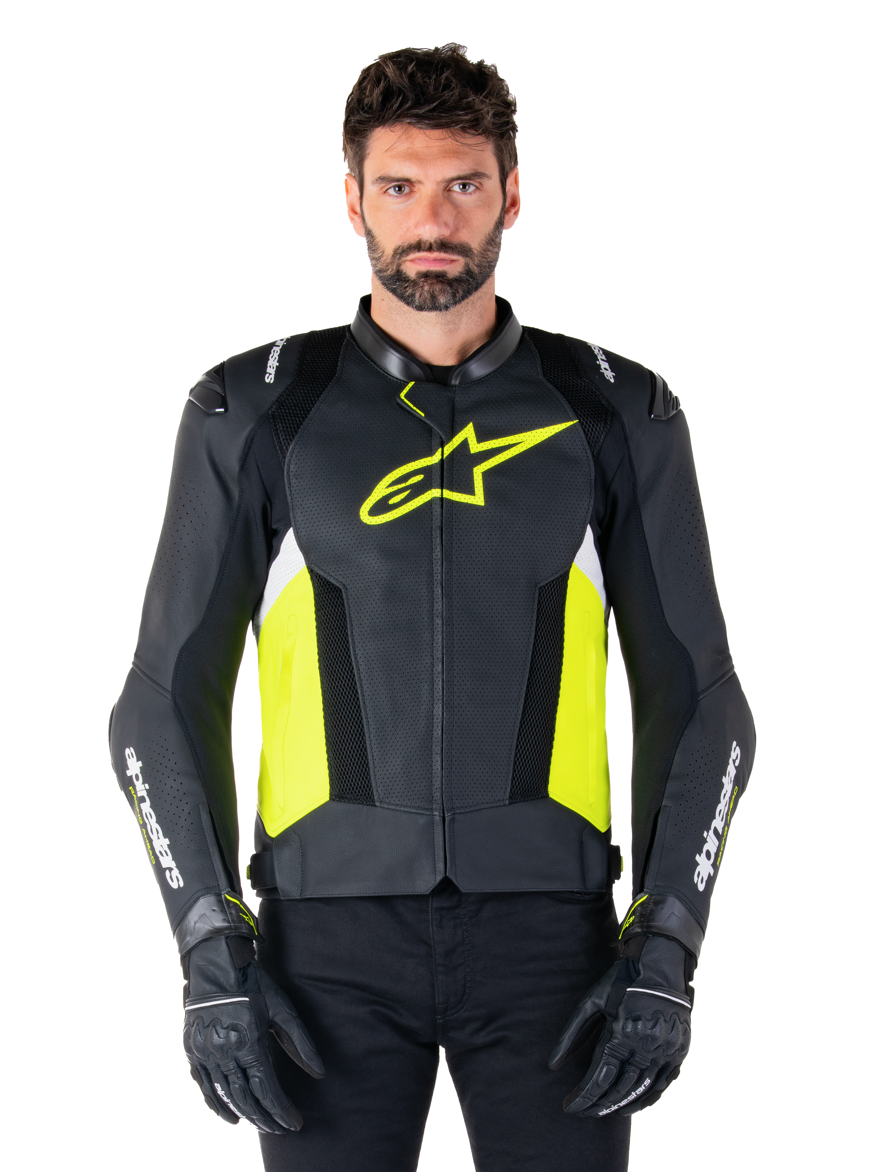 Veste en cuir Alpinestars Missile V3 Airflow, veste de moto sport racing, noir, jaune fluo et blanc, portée par un mannequin avec des gants de moto noirs, dotée de cuir perforé sur la poitrine, d'un logo jaune fluo éclatant et d'un marquage blanc sur les manches