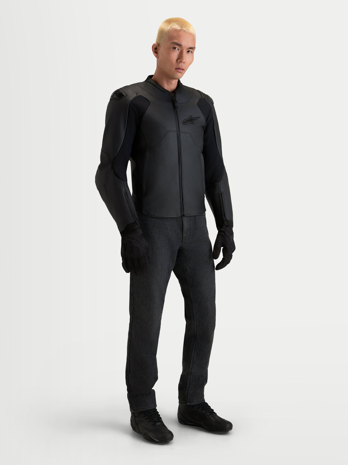 Alpinestars Caliber V2 Leather Jacket, Men's Black motorcycle leather jacket with sport fit, AA-rated protection, and low-profile DFS shoulders, worn by a model