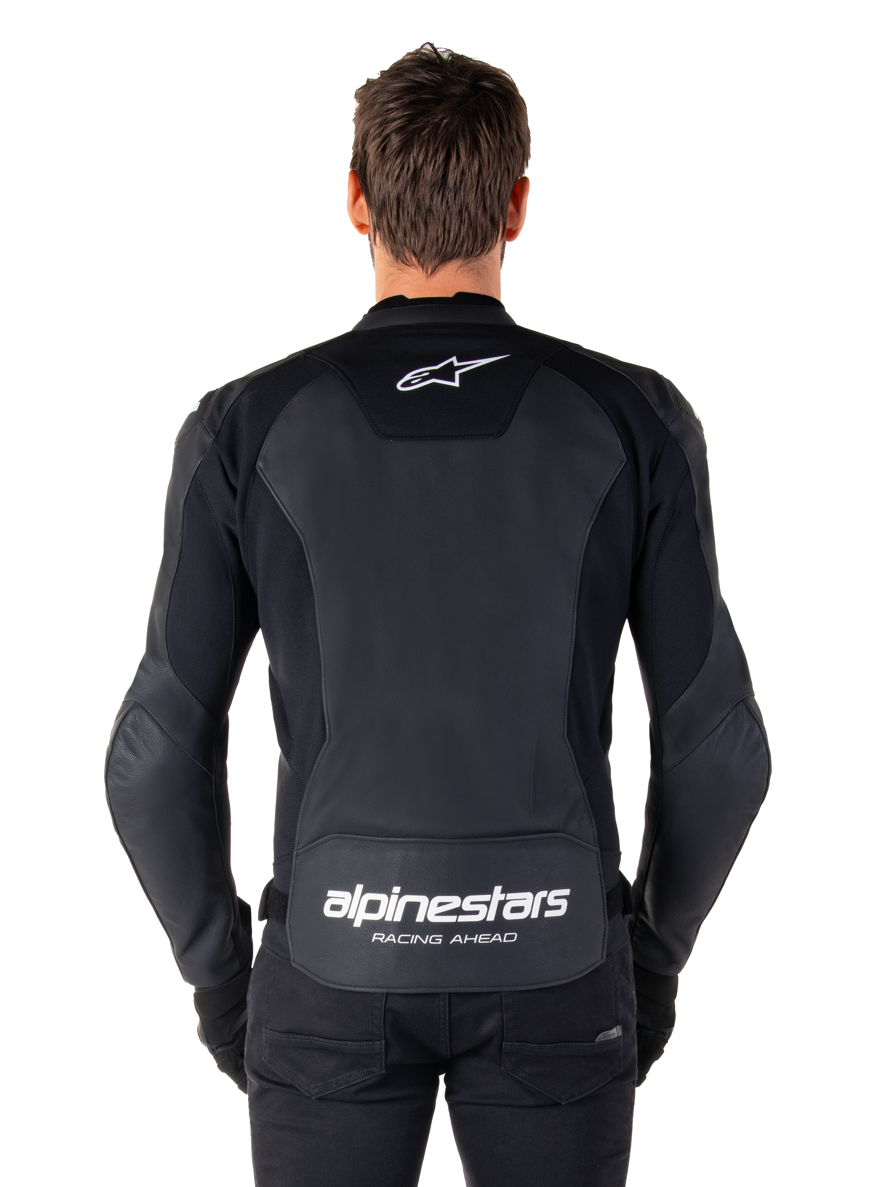 Veste en cuir Alpinestars Faster V3, veste de moto sport, noir avec logos blancs, vue de dos portée par un mannequin, arborant le logo Alpinestars sur le haut du dos et l'inscription « RACING AHEAD » sur le bas, construction en cuir premium avec panneaux extensibles ergonomiques.