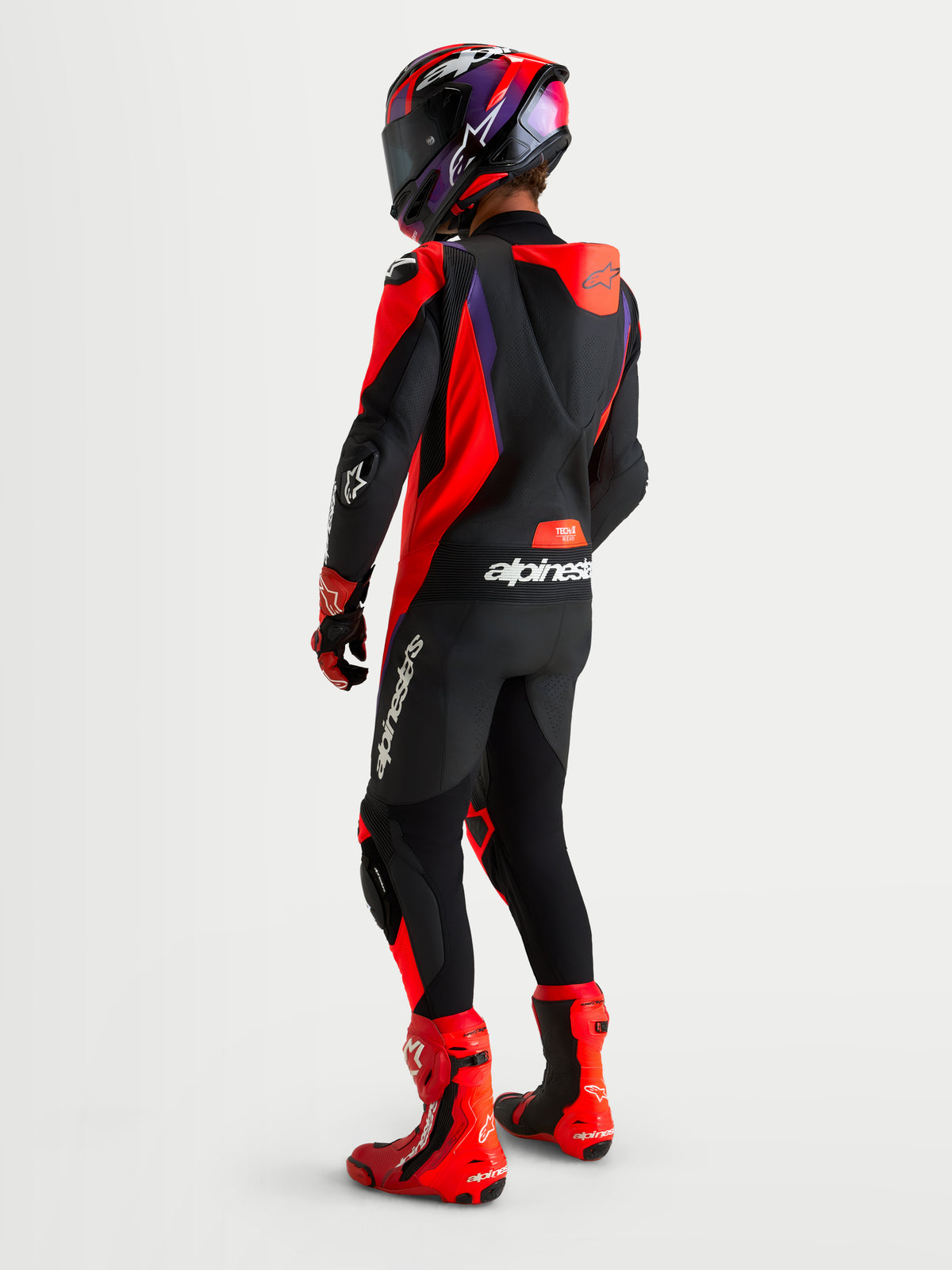 Alpinestars Combinaisons Missile V 3 Leather Combinaison 1 Pc, combinaison en cuir pour moto de course, noire, rouge et violette, avec bosse aérodynamique, vue de dos