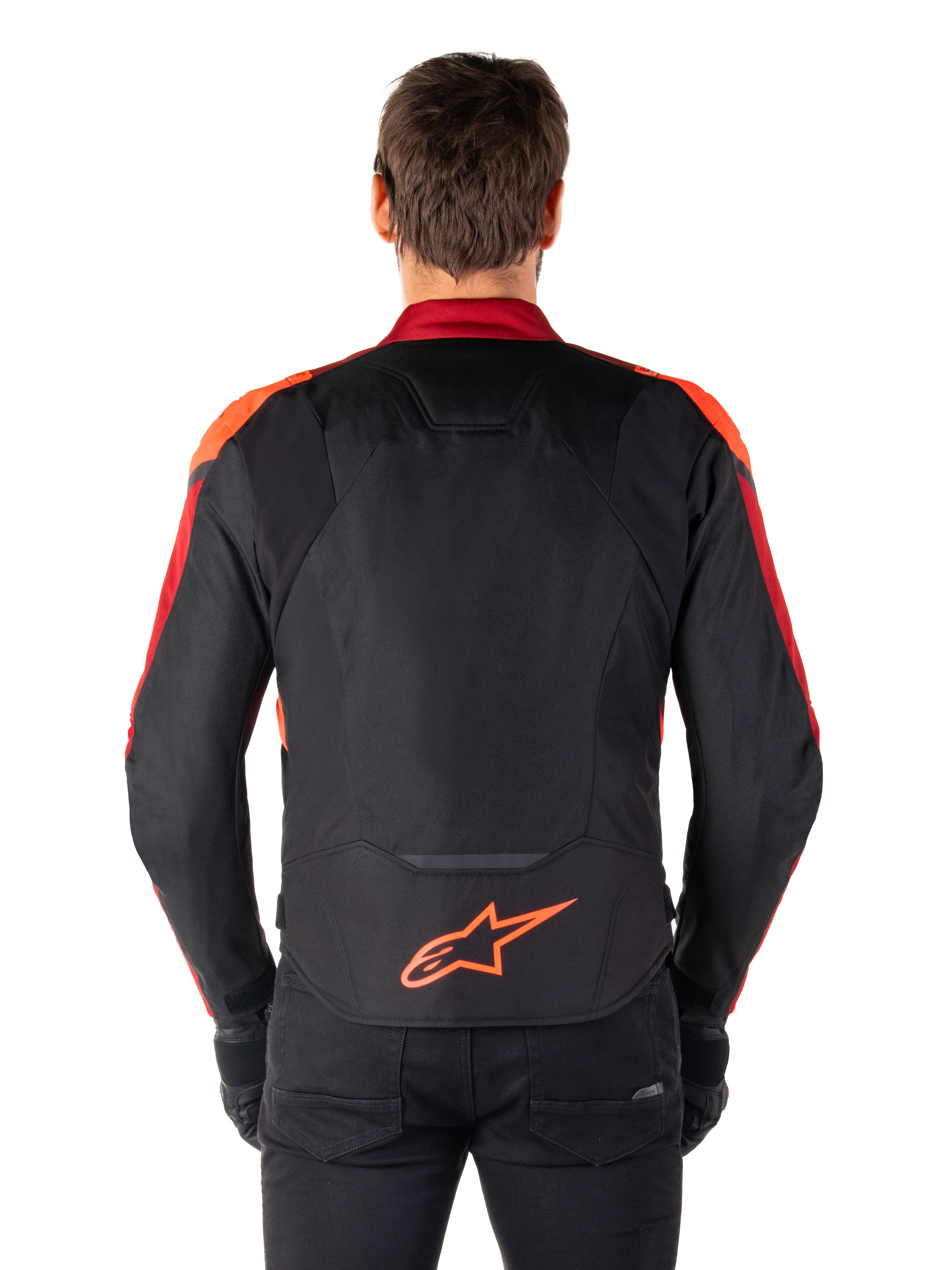 Alpinestars T-Jaws V4 Waterproof Jacket, Rear view, Black with Red Fluo and Dark Red accents, orange logo on lower back, extended back panel for riding coverage, sporty textile motorcycle jacket