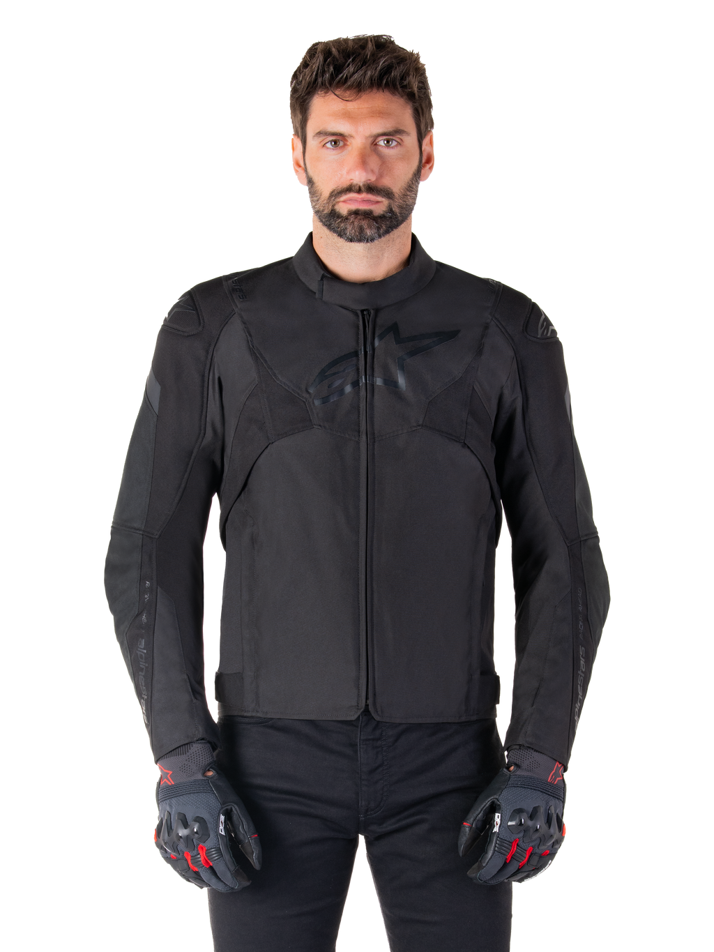 Alpinestars T-Jaws V4 Waterproof Jacket, Black Motorcycle Sport Jacket, worn by a man with black gloves featuring red accents, reinforced shoulders and arms, sleek design with subtle chest logo, textile all-weather riding gear