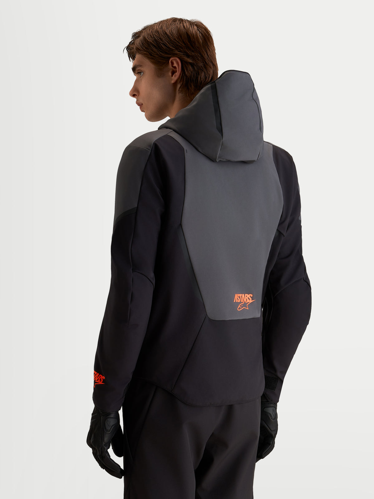 Alpinestars Aeroshell Wp Veste, veste de moto sport softshell pour homme, noire et gris foncé, avec capuche intégrée, vue de dos